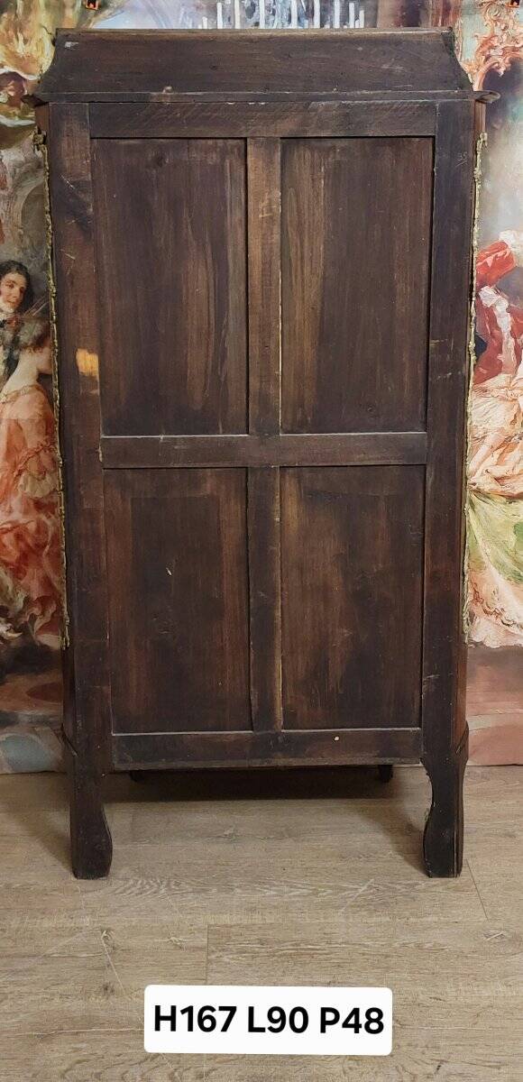 Curved display cabinet in Louis XV style with precious wood marquetry and gilded bronze.