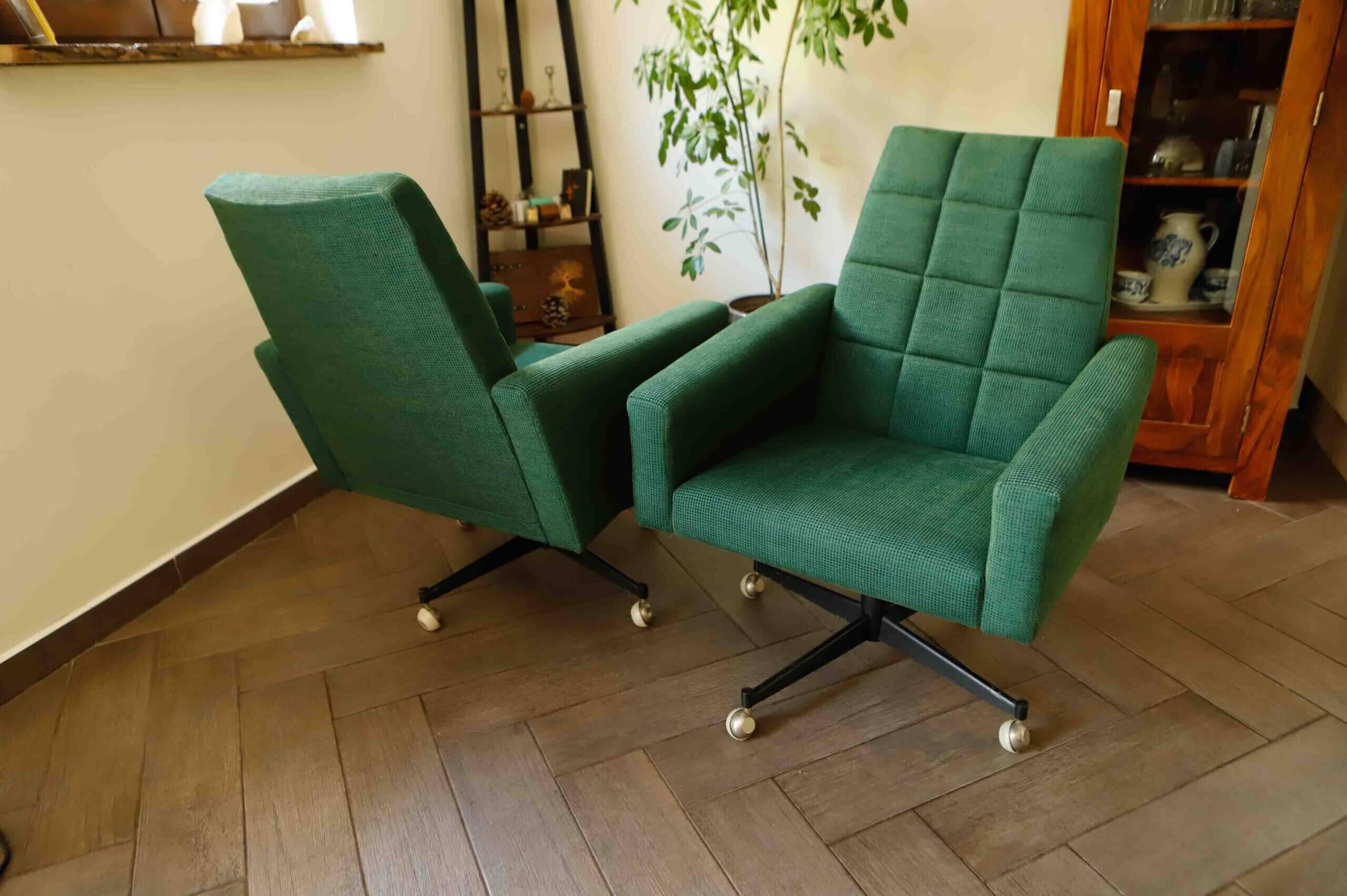 Pair of retro swivel chairs on casters