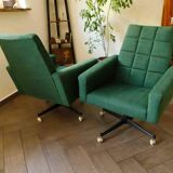 Pair of retro swivel chairs on casters