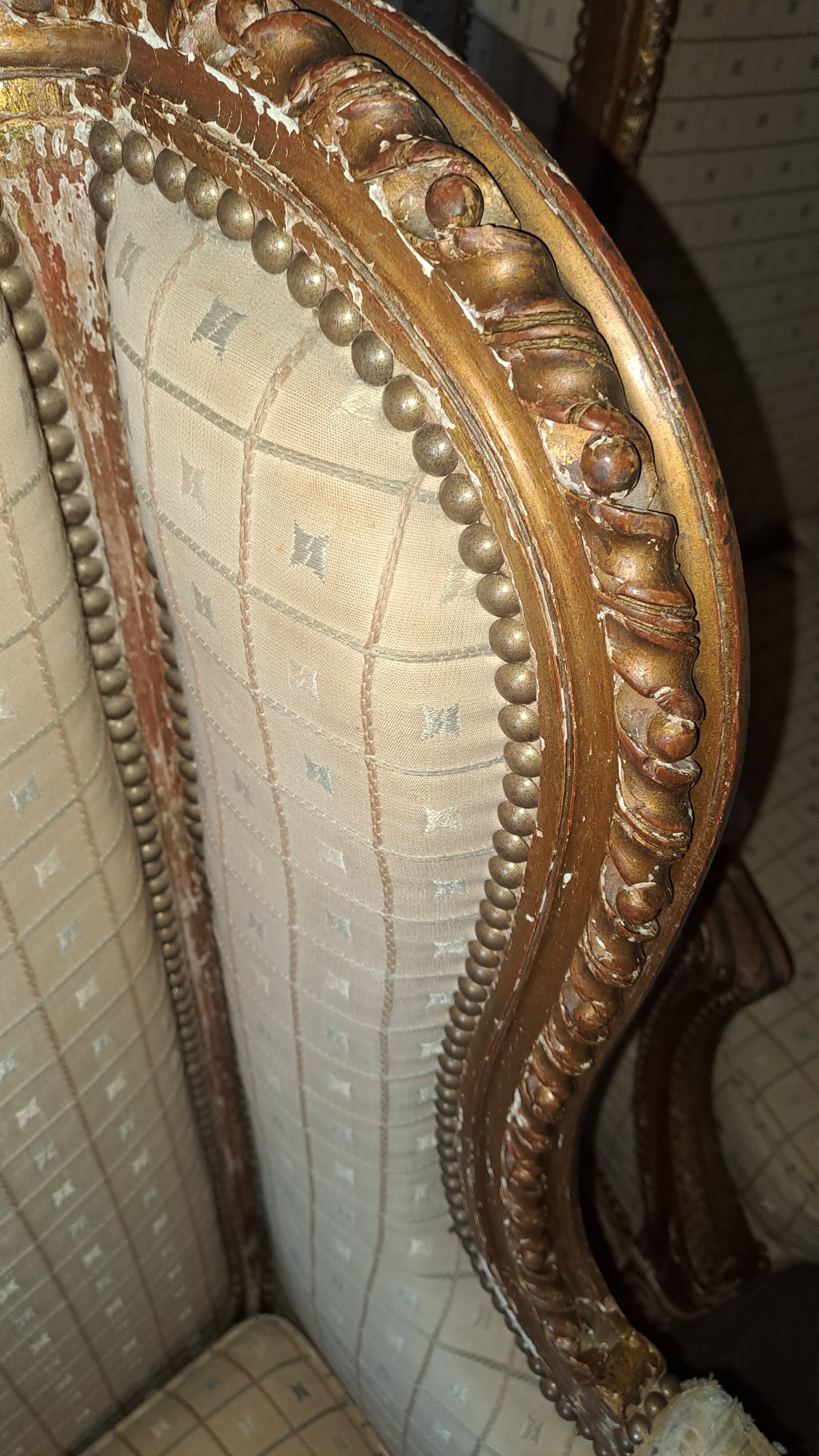 Pair of restored Louis XV wingback armchairs – new fabric