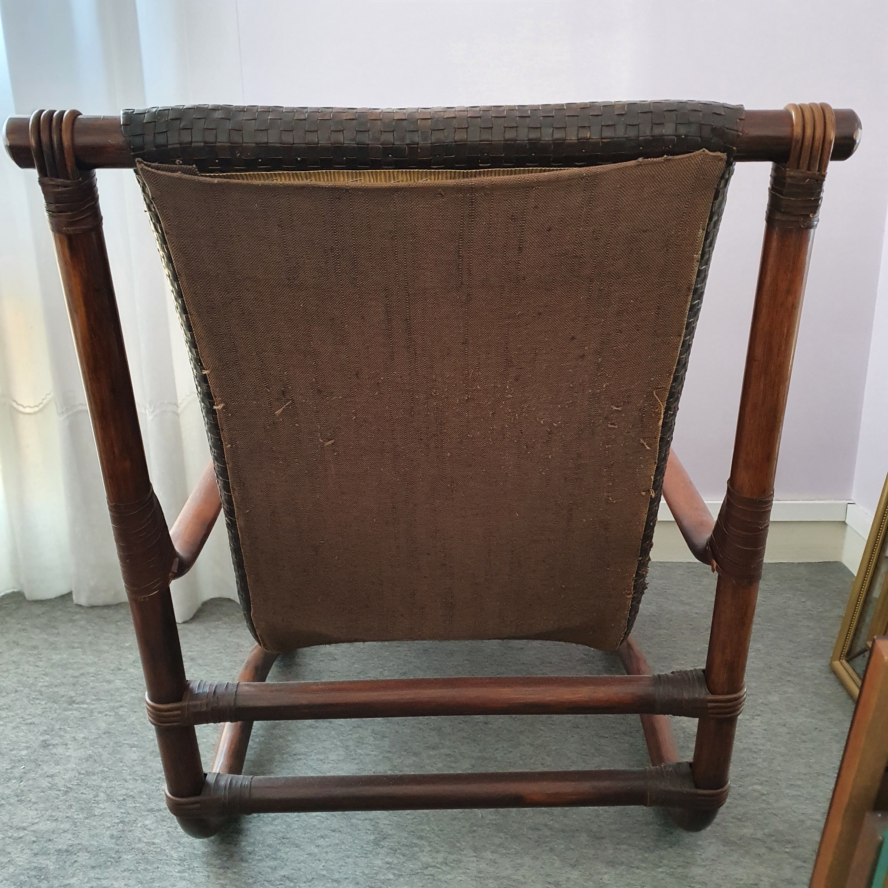 Rattan and leather rest chair