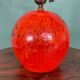 Lampe en céramique HAK Herman Kähler Art Déco, vers 1930, globe orange avec détails en laiton.