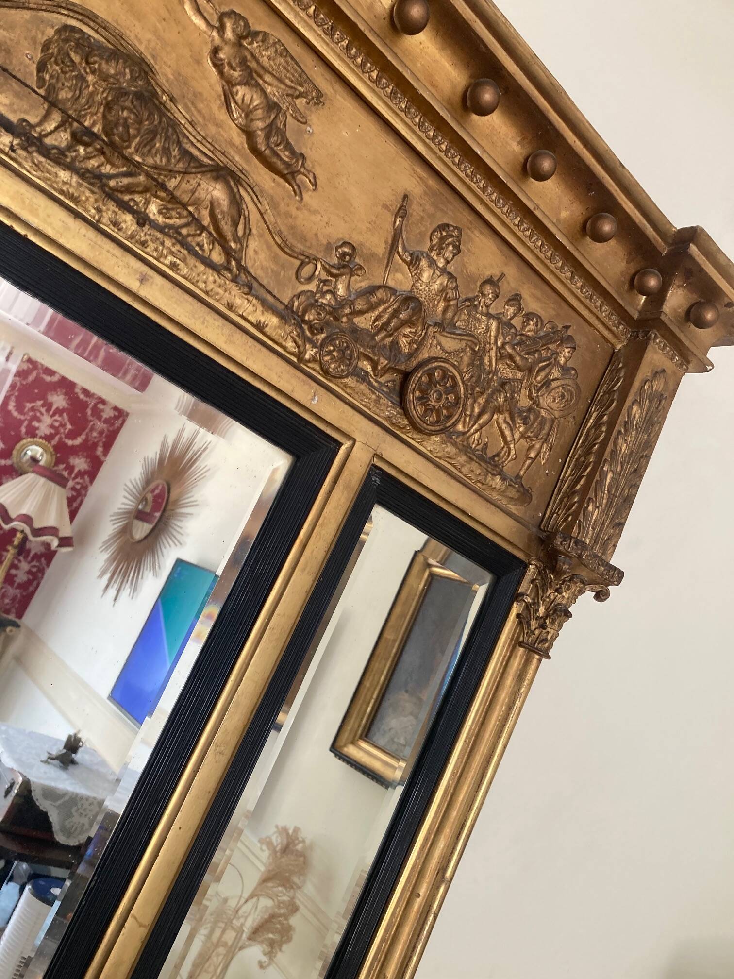 Empire style triptych mirror in gilded wood