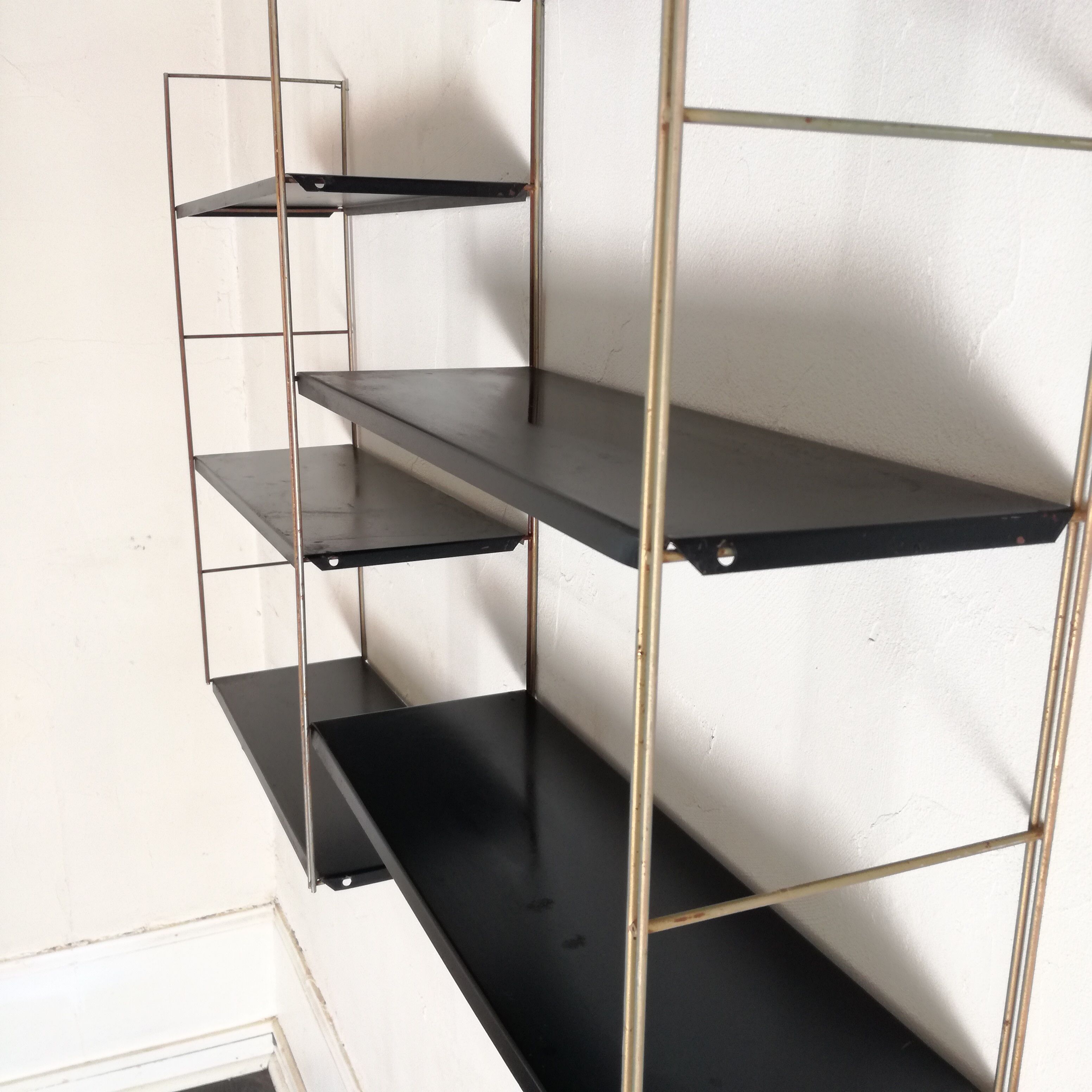 Gold and black String shelf