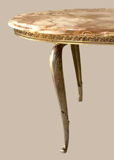 Oval coffee table in onyx and brass 1950