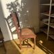 6 carved wooden chairs with cane seats