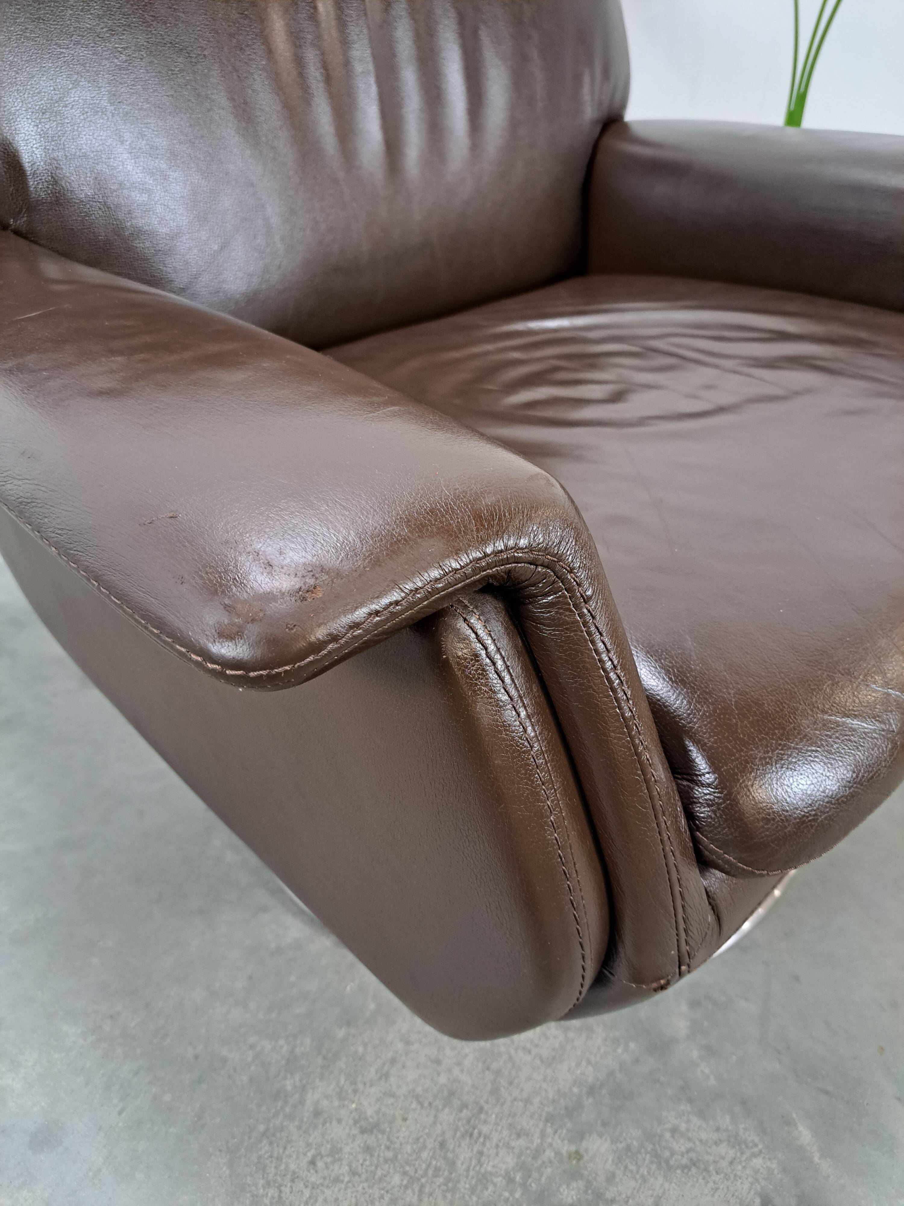 Brown leather swivel chair