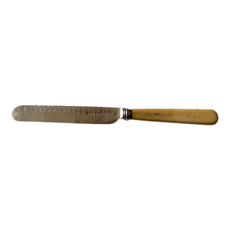 Old silver metal butter knife