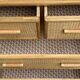 Rattan and wicker chest of drawers and mirror from the 1970s.