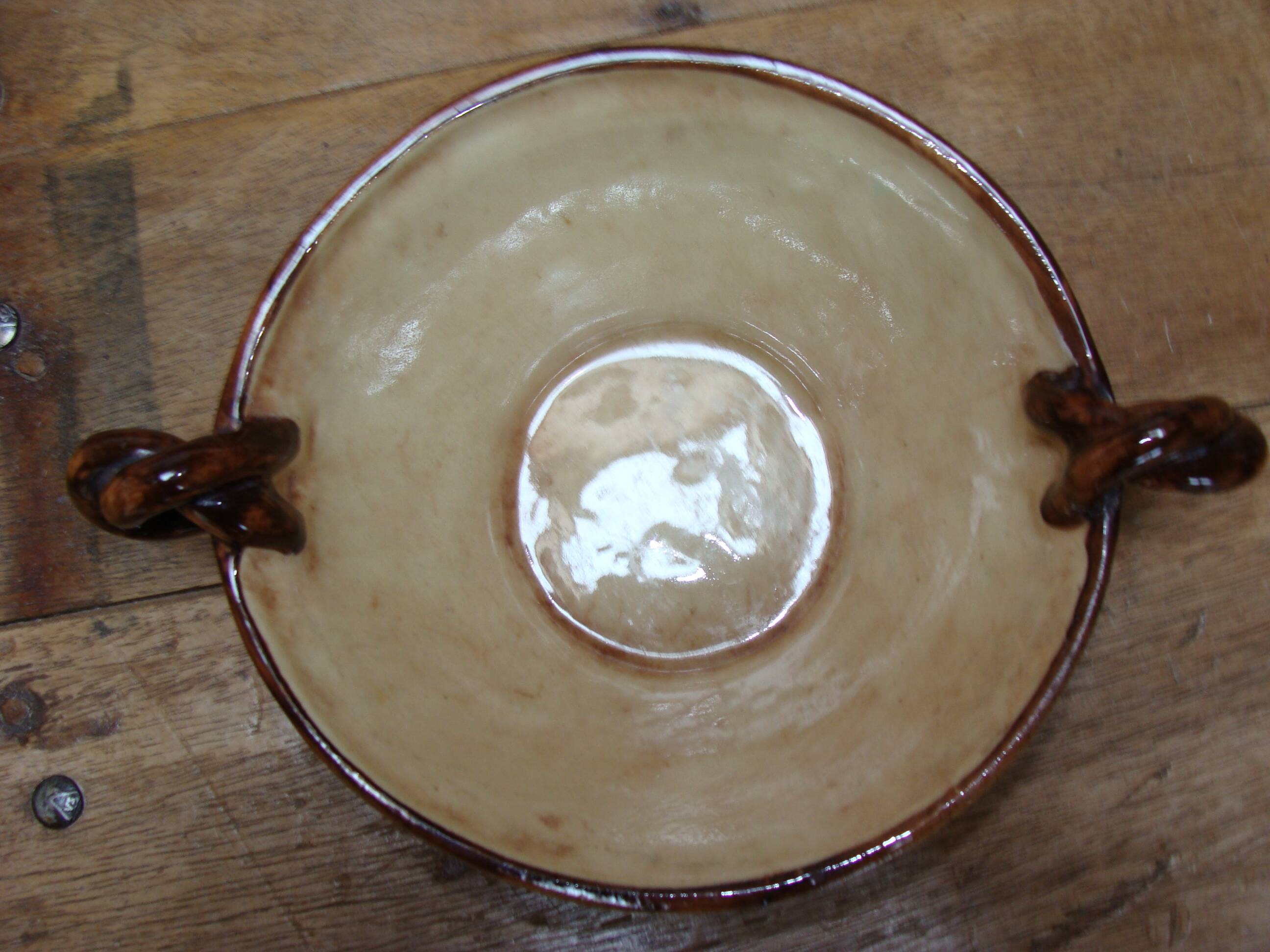 Antique engraved and enamelled ceramic cup