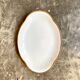 Oval dish in white and golden Limoges porcelain