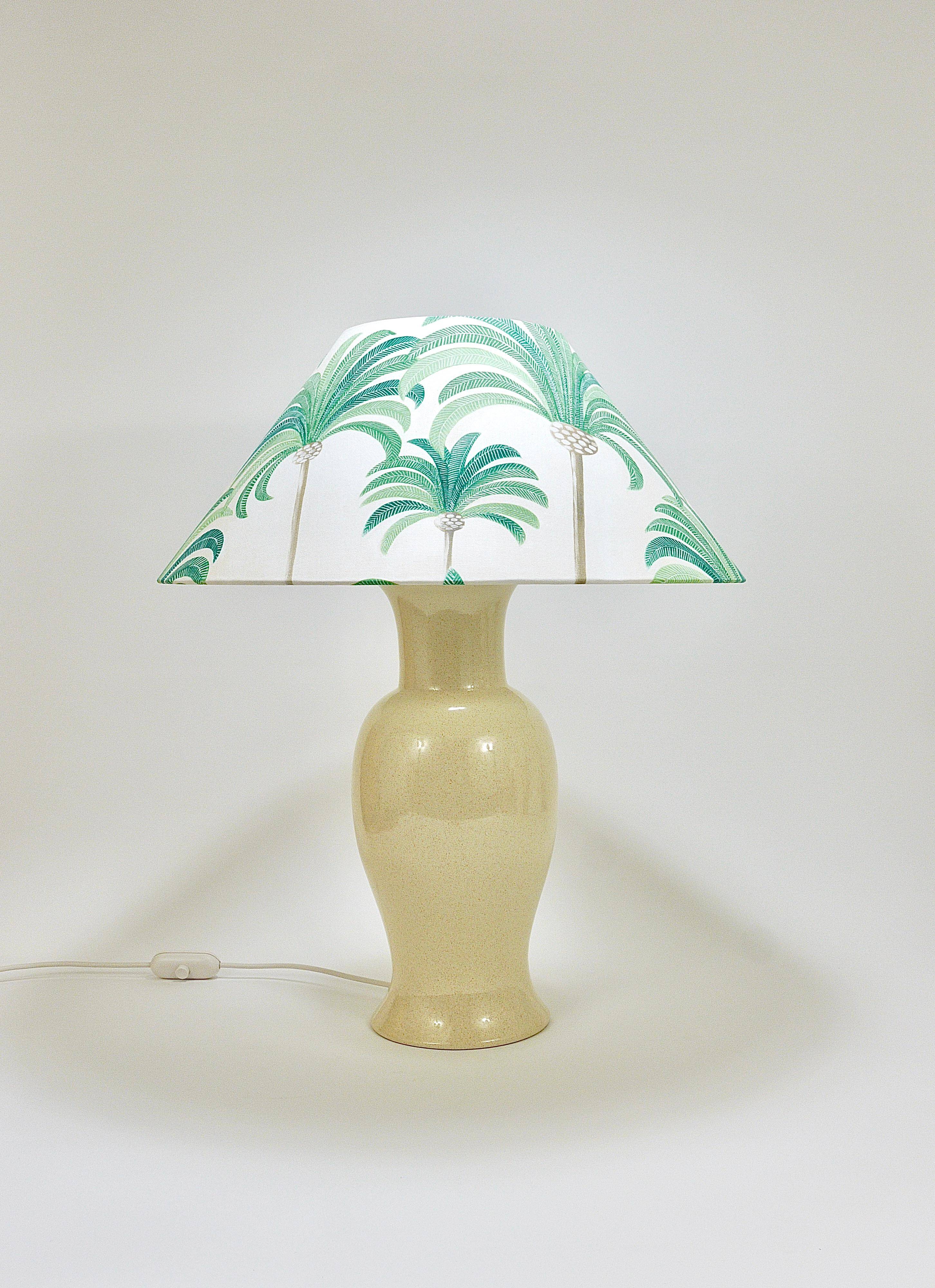 Pair of Tommaso Barbi Riviera palm tree table lamps from the 1970s with matching cushions.
