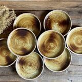 4 small stoneware plates