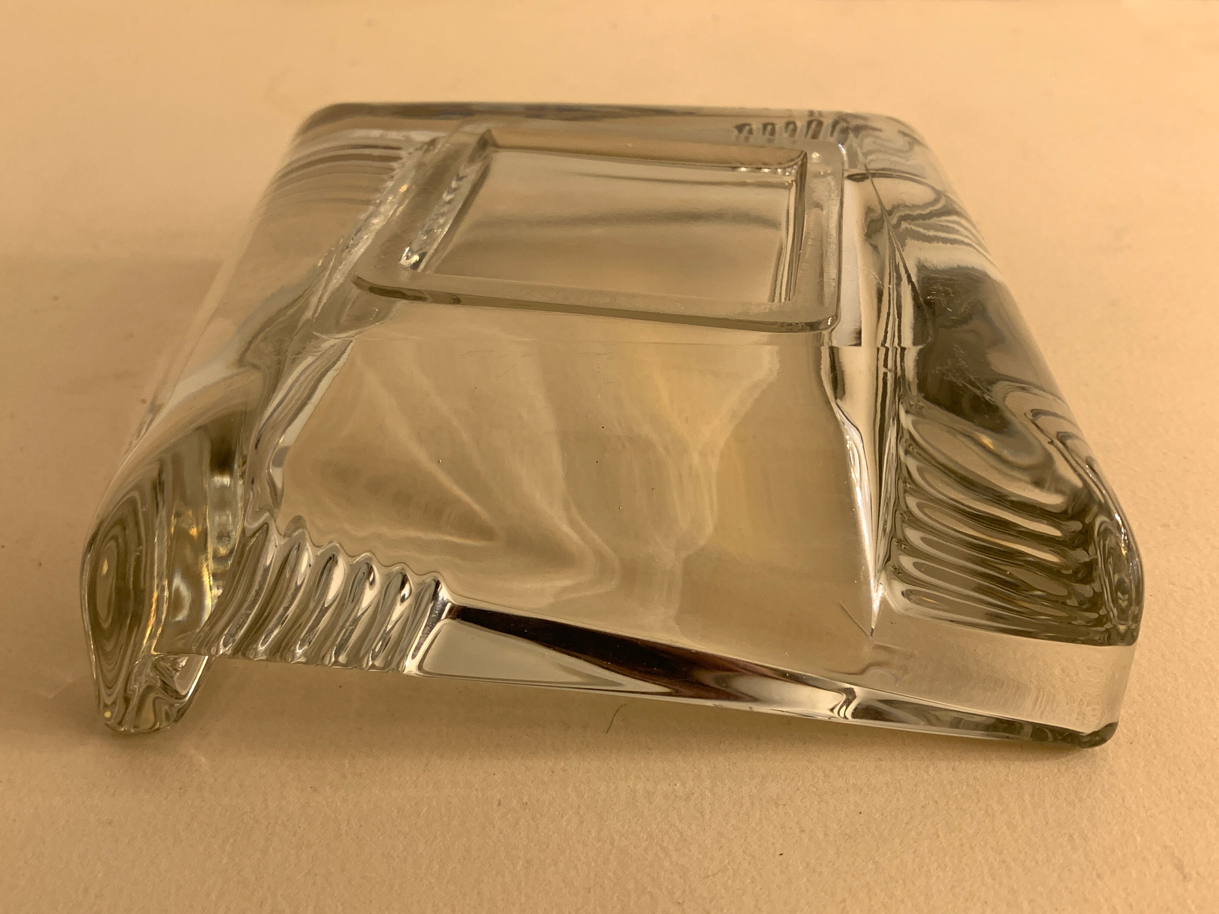 Transparent moulded glass ashtray