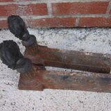Pair of old cast-iron and bronze chenet
