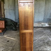 Vintage oak bookcase from the reconstruction period with 2 doors with small panes.