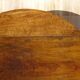 Walnut drop-leaf table with honey spoon legs.