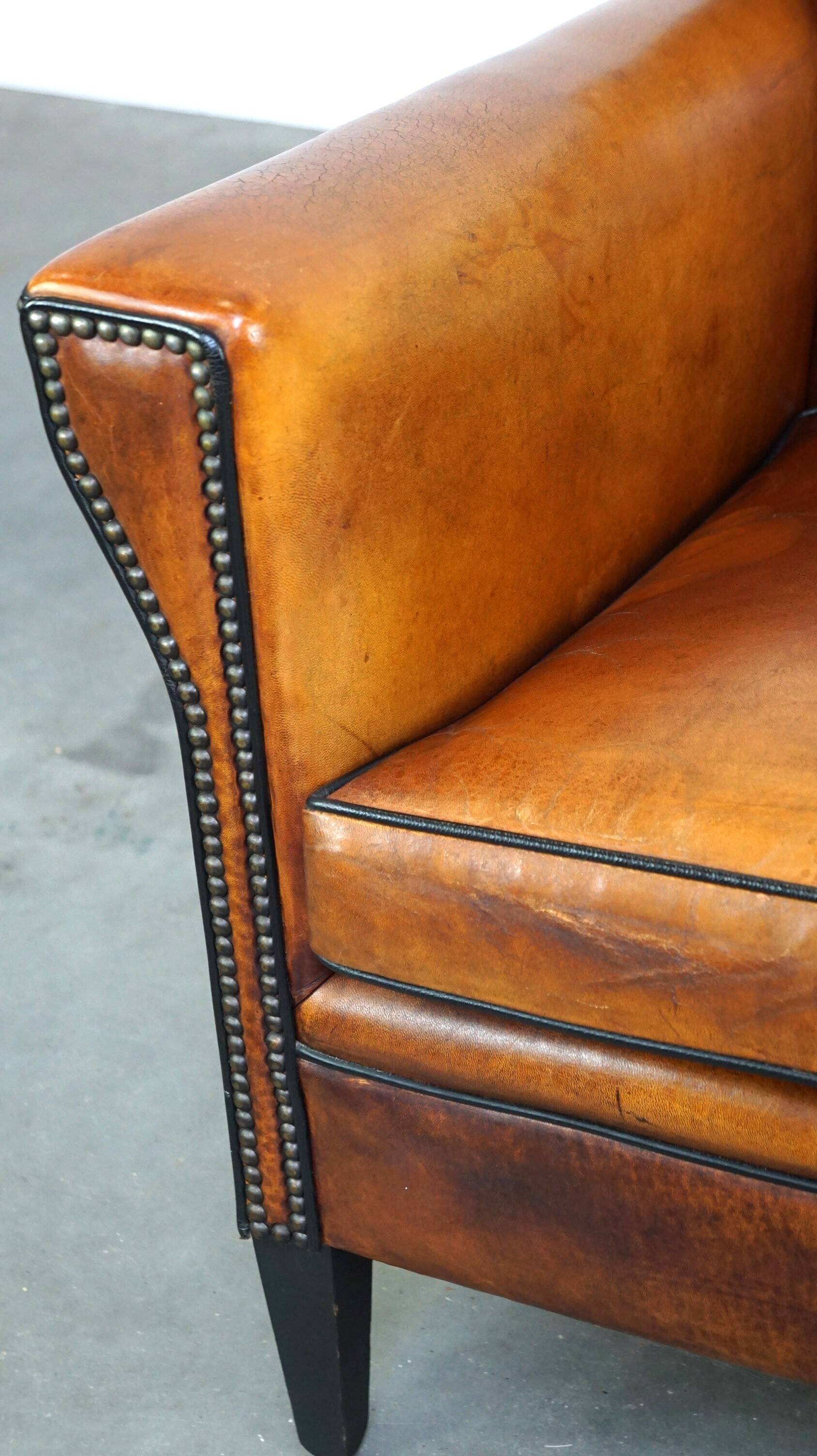 Sleek sheepskin Art Deco design armchair with beautiful details