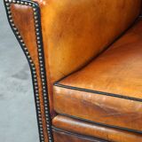Sleek sheepskin Art Deco design armchair with beautiful details