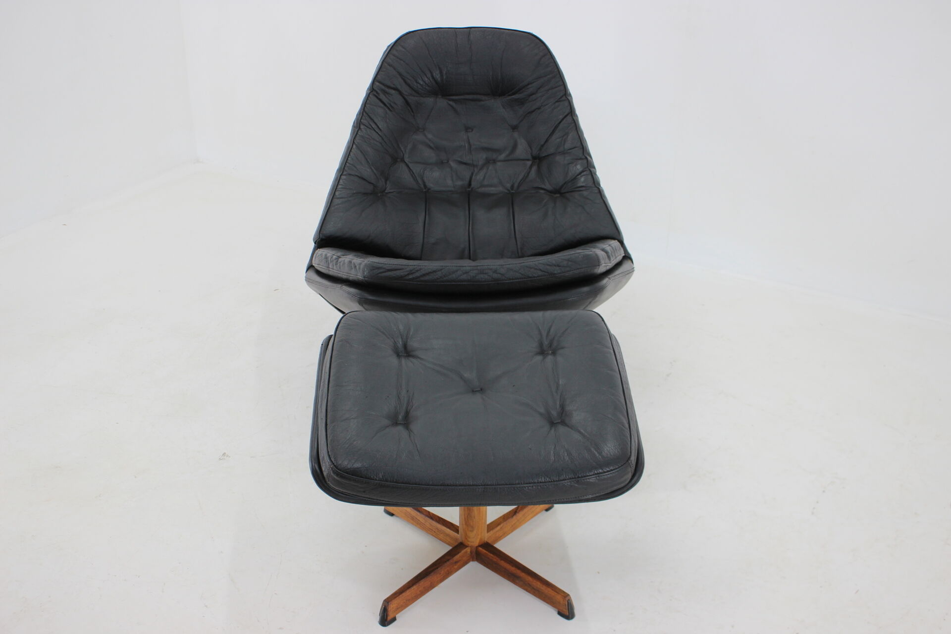 Madsen and Schubell Black Leather Reclining Chair and Stool, Denmark 1960