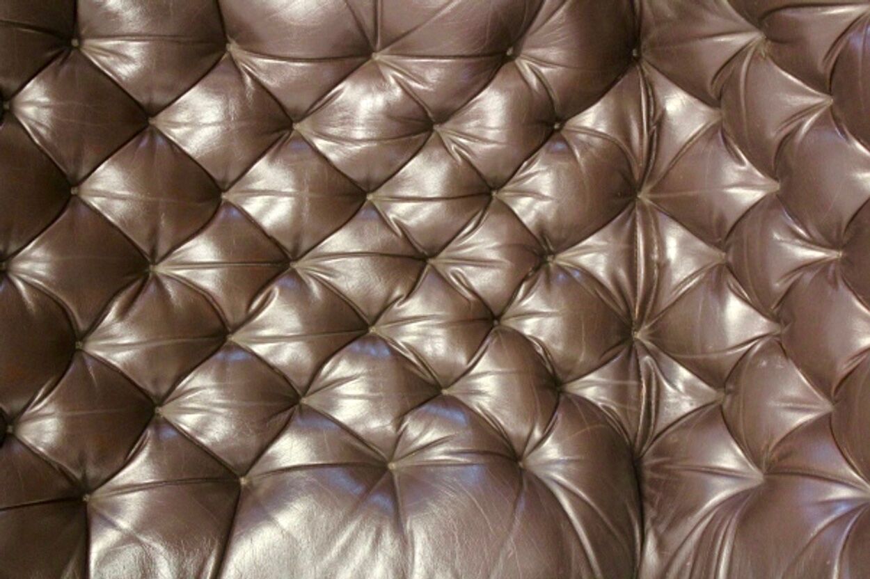 Paire de fauteuils 'bore' en cuir Noboru Nakamura avec pouf, années 1970