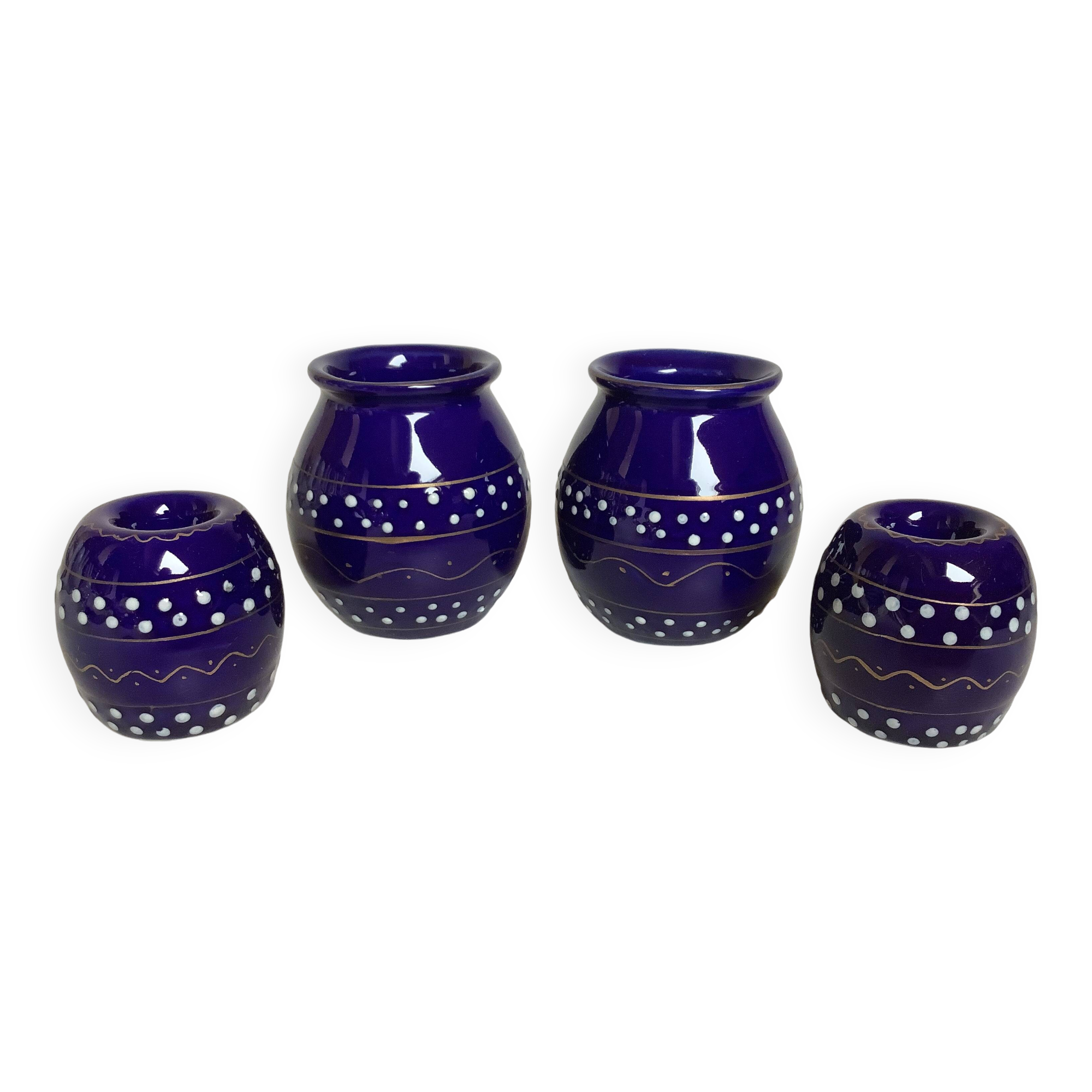 Pair of small enamelled cobalt blue candlesticks and vases