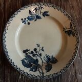 Ancient round iron earth dish