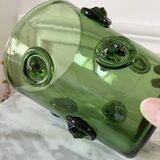 Vase à têtes de lion