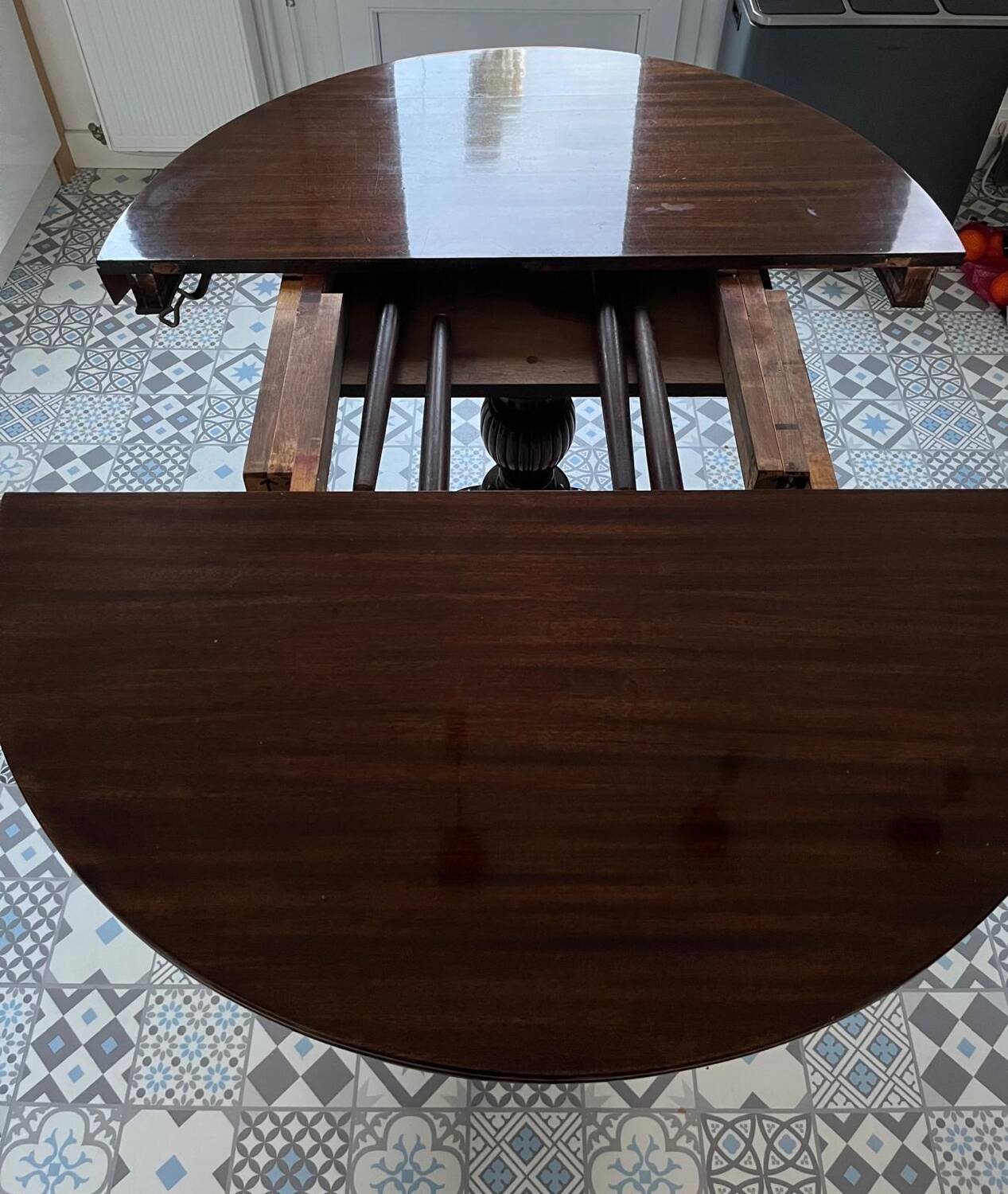 Empire-style table in solid walnut.