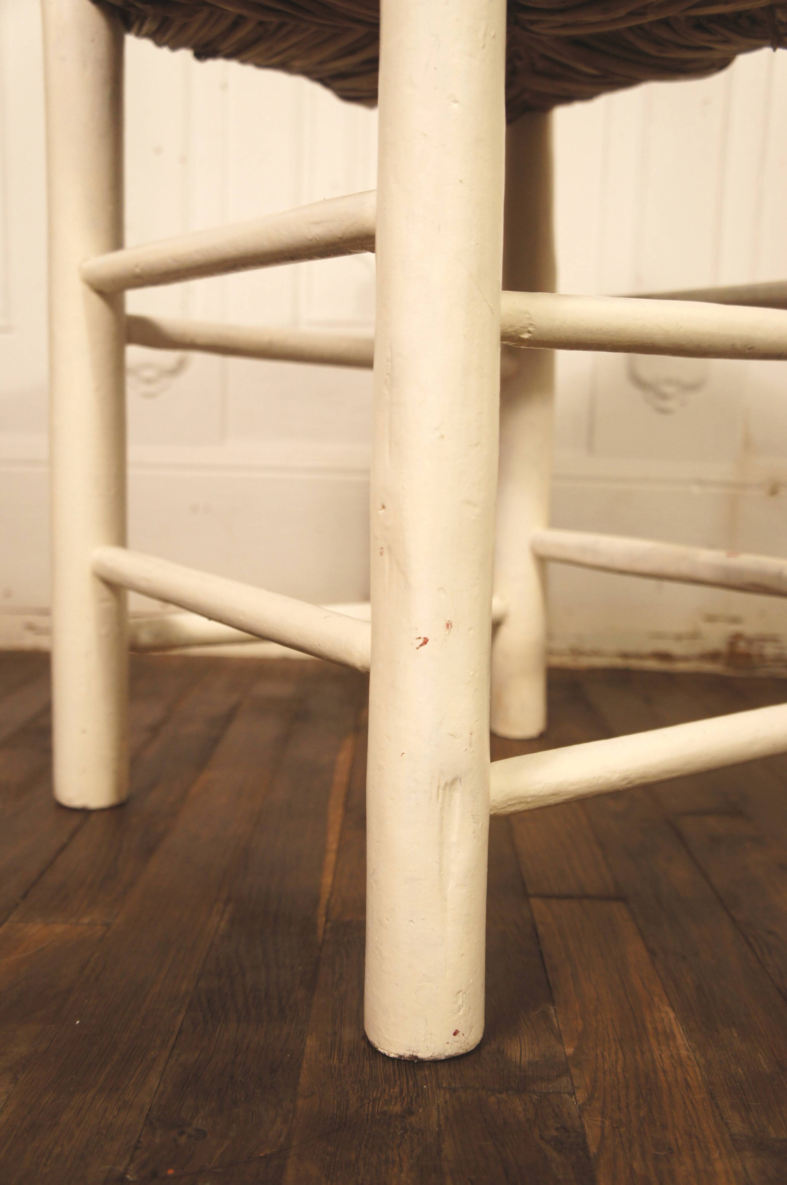 Old stool in wood & straw