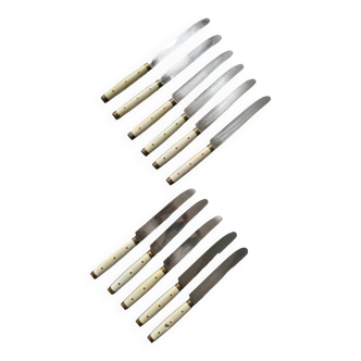 Series of 11 vintage serrated table knives