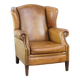 Sheep leather wingback chair with patina