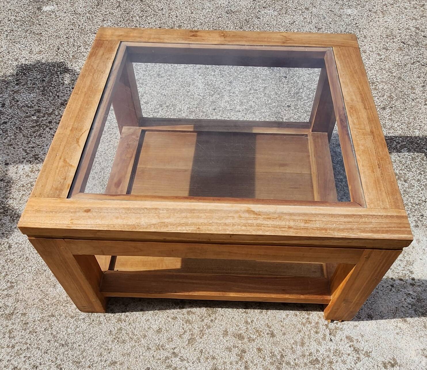 Glass coffee table in wood
