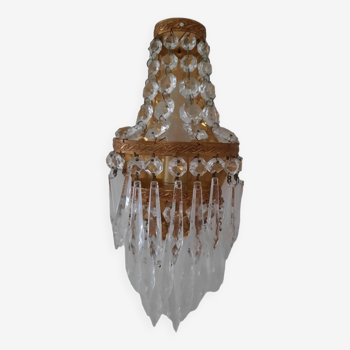 Wall light with tassels