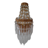 Wall light with tassels