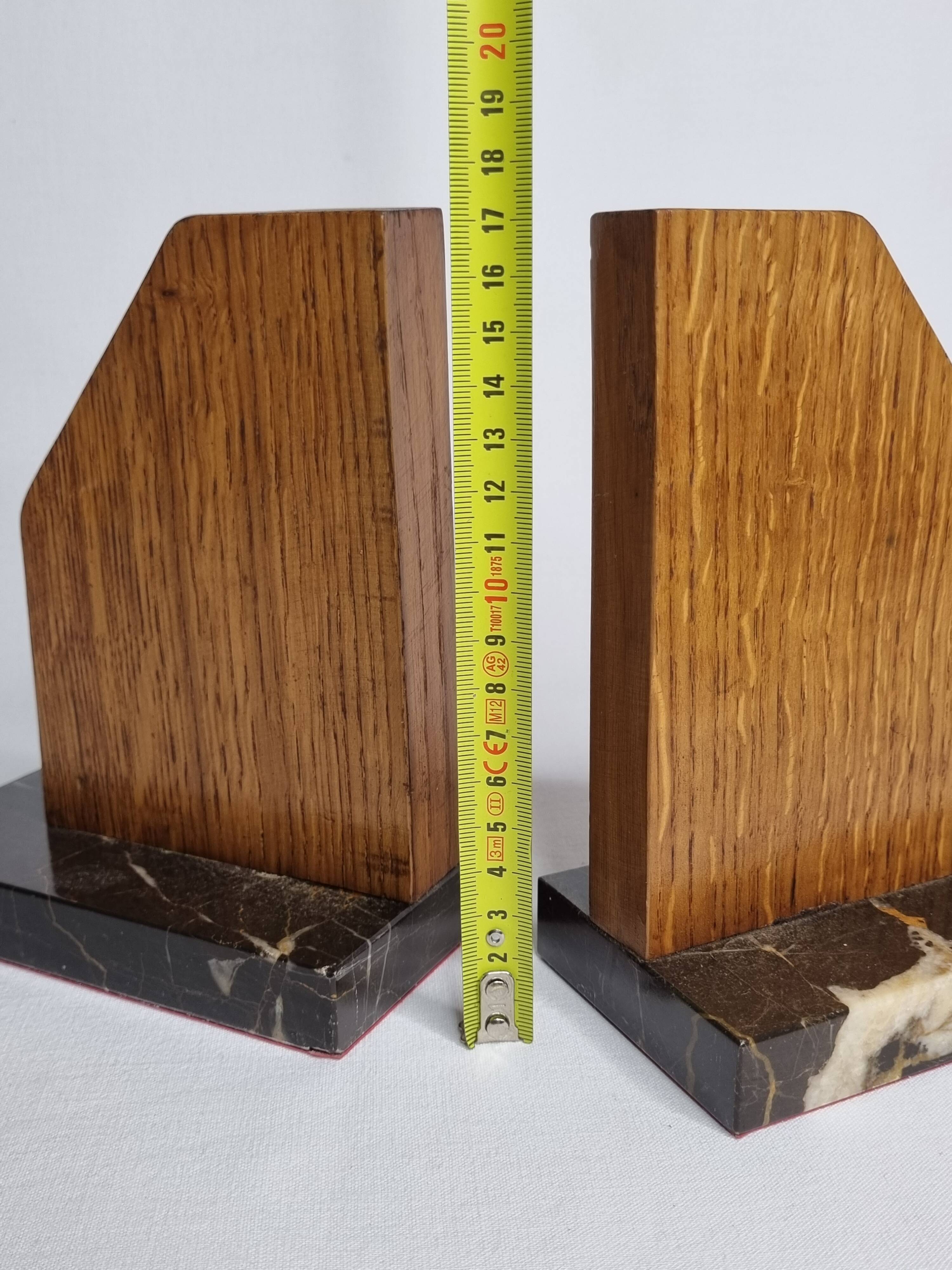 Pair of Art Deco bookends in solid wood and veined black marble
