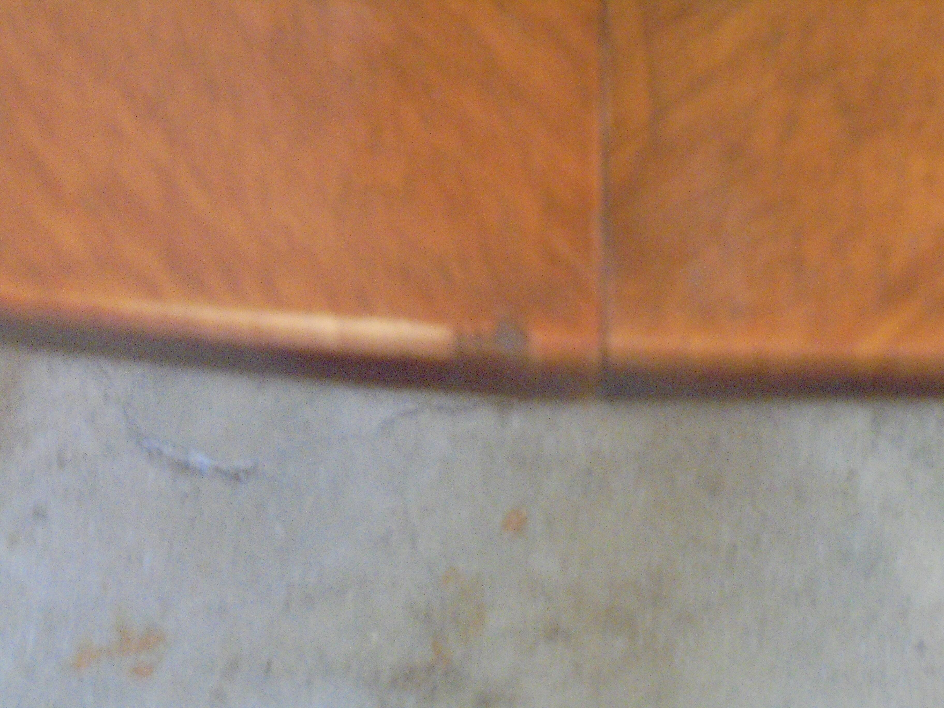 Mahogany round table with 4 extensions from the 1950s