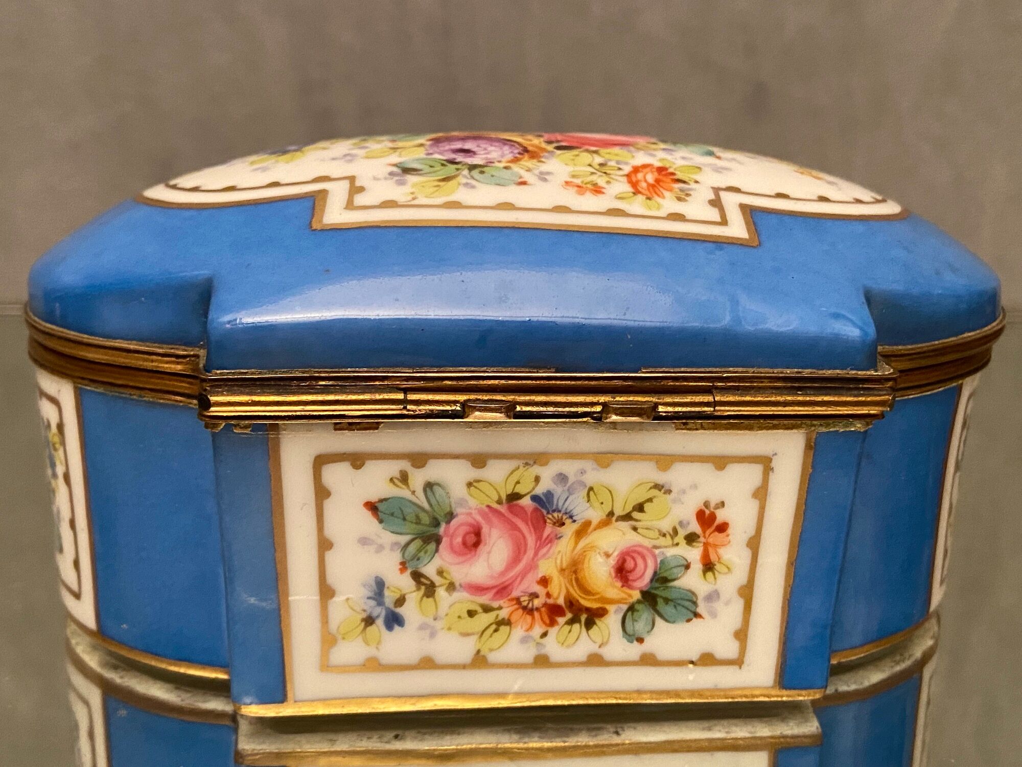Domed porcelain box polychrome floral decoration on blue background brand Sèvres