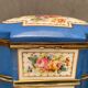 Domed porcelain box polychrome floral decoration on blue background brand Sèvres