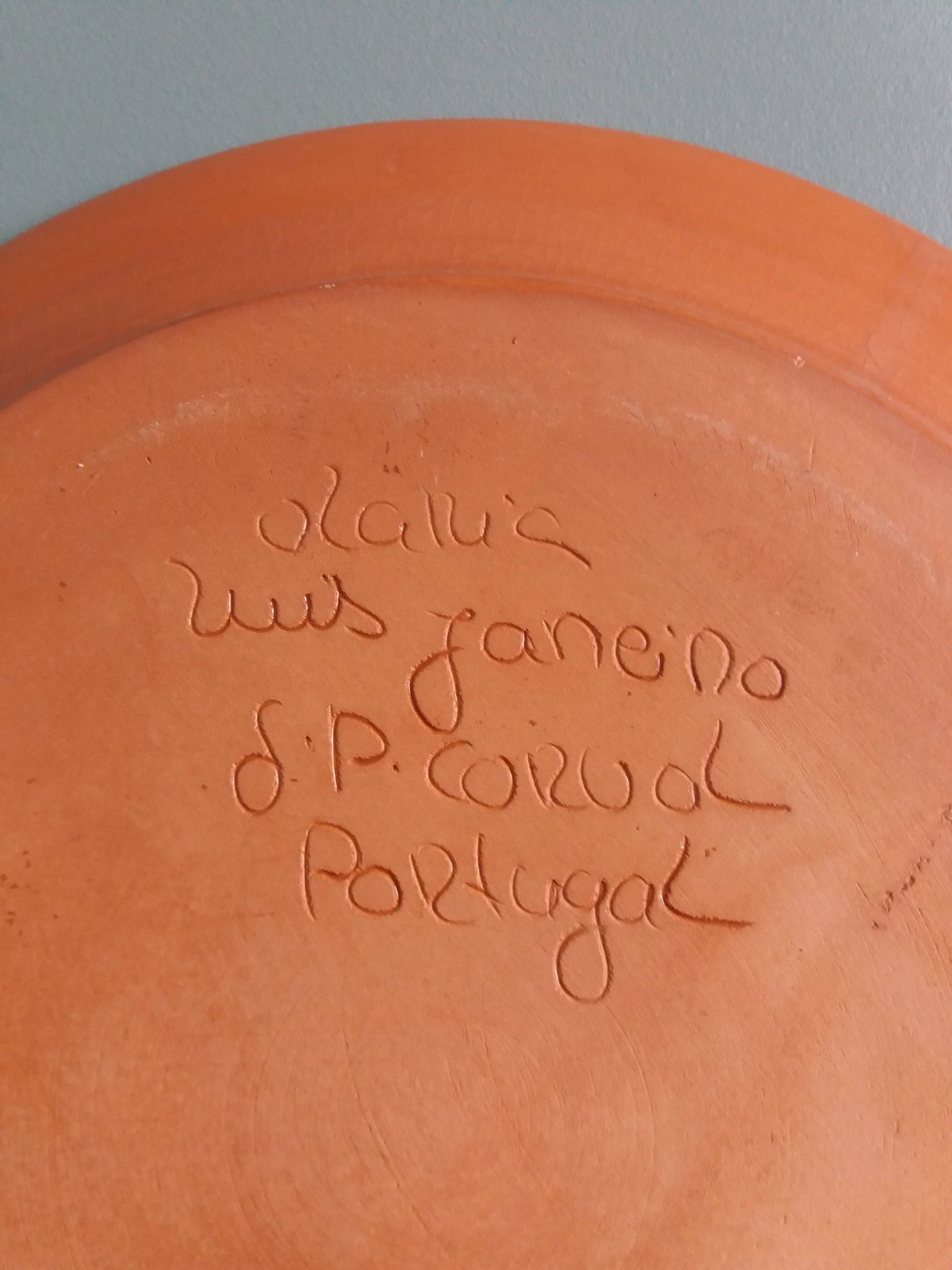 Plate signed Luis Janeiro, Portugal, enamelled terracotta plate