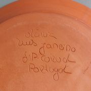 Plate signed Luis Janeiro, Portugal, enamelled terracotta plate
