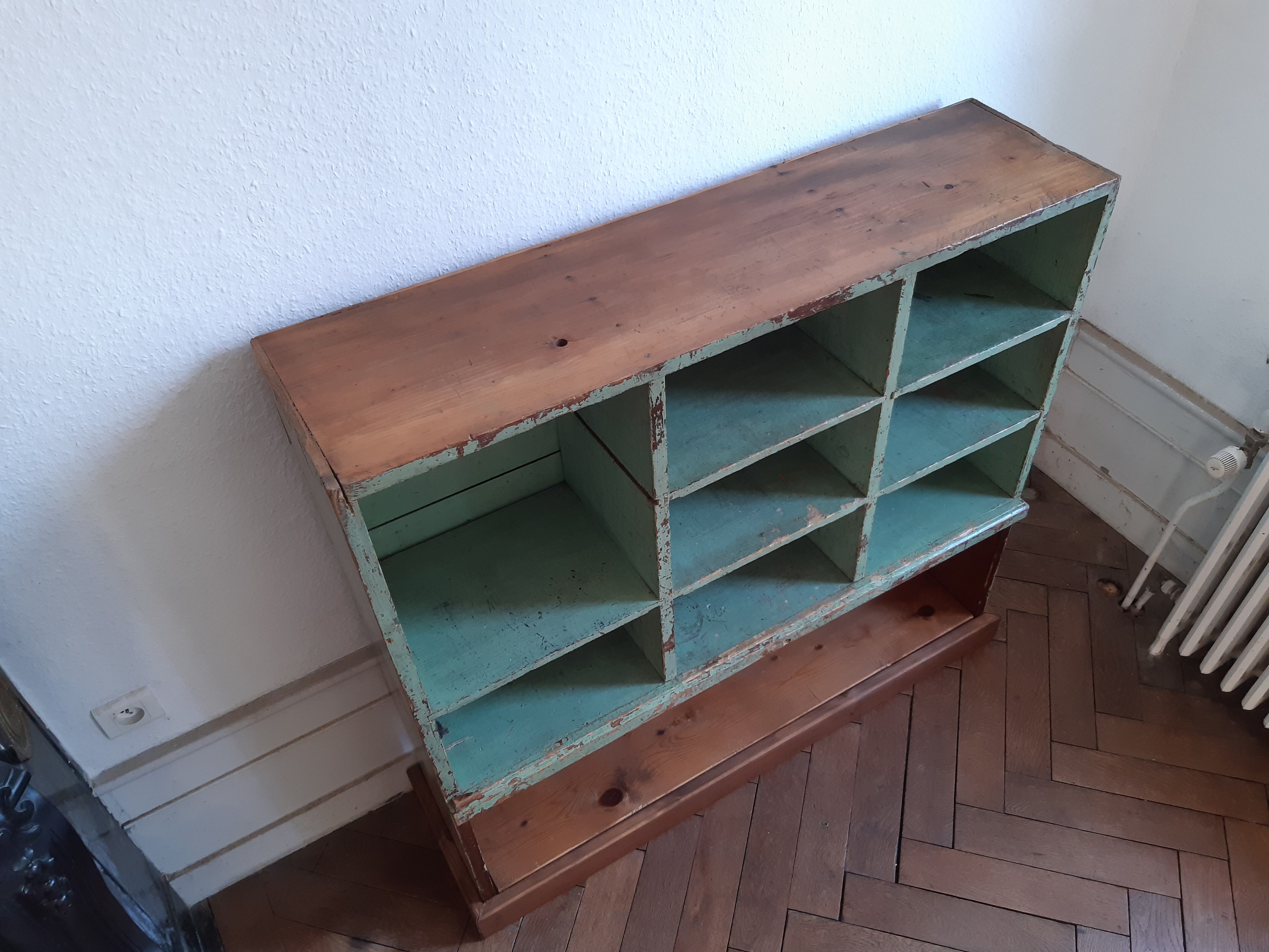 Old library shelf in patinated grocery tree
