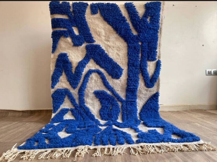 Wool rug with geometric patterns 200/300