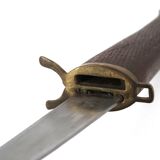 Fish knife and fork with a wooden and brass sheath sculpture.