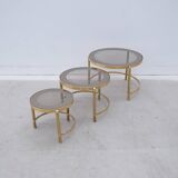 Brass and glass nesting coffee tables, 1970
