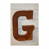 Industrial letter "g" in iron