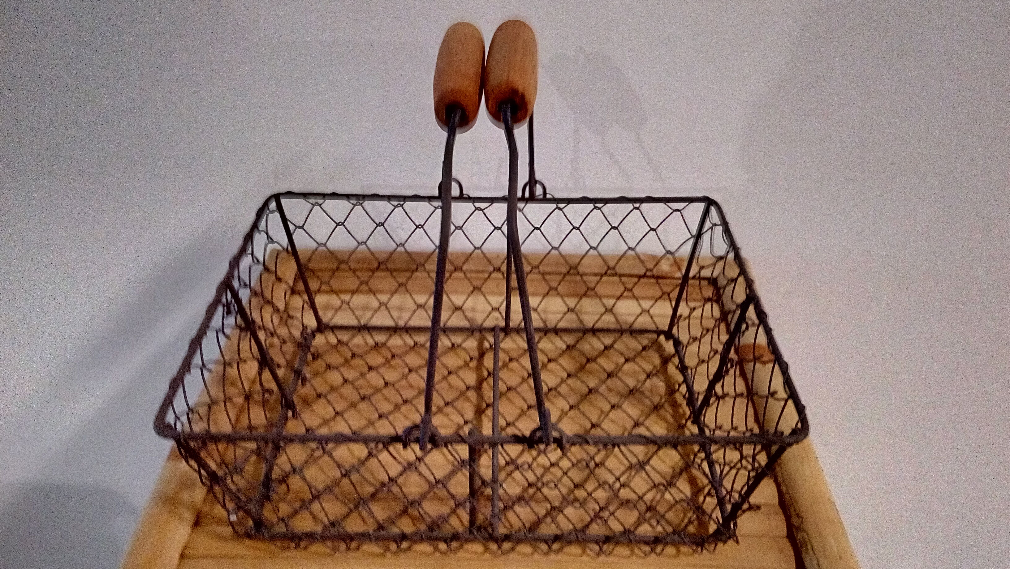 Duo of aged metal mesh baskets