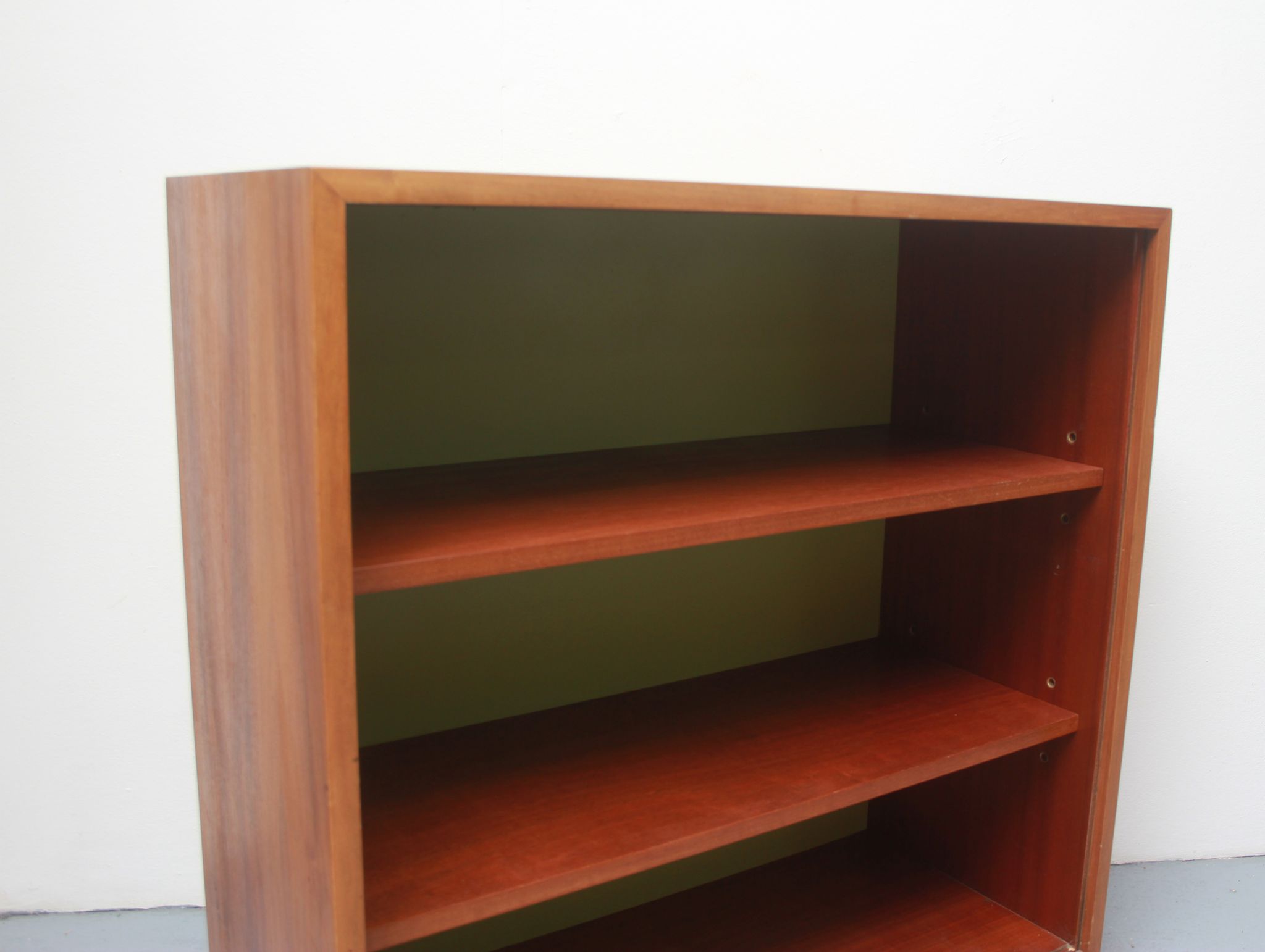 1960s bookcase with green back panel