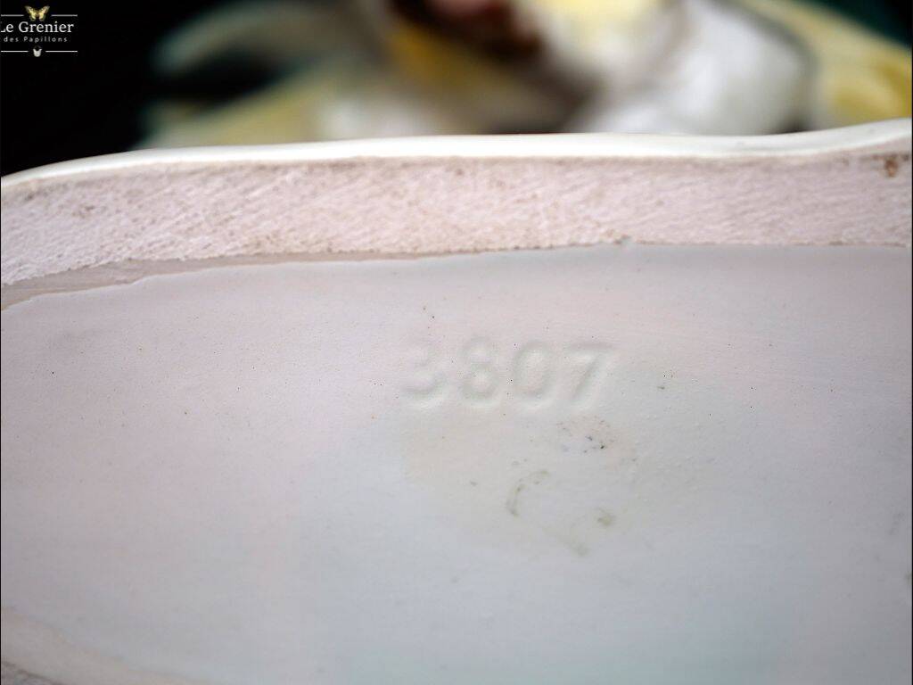 Figurine en faïence, une paire de perroquets en porcelaine allemande