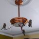 Petit lustre en cuivre "oiseaux" art déco.